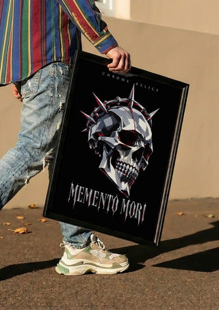 Memento Mori by Melancholy Machinations carried in a black frame along a sunny street