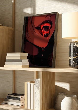 Let me taste you by Melancholy Machinations in a dark frame on a wooden shelf beside books and a lamp