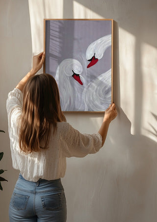 The Swirl of Us by Bibi being hung on a sunlit wall