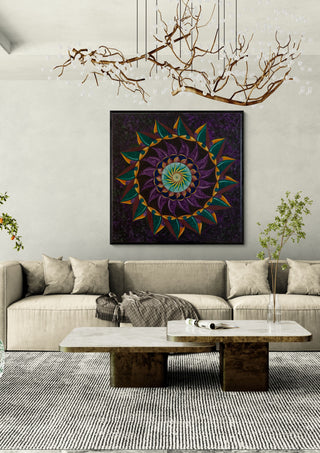 ShamanVision by Eledina in a black frame above a beige sofa under a branch chandelier