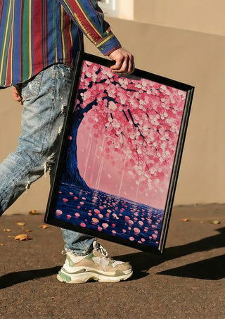 Cherry Blossom over Water by Yokohama carried in a black frame along a sunny street