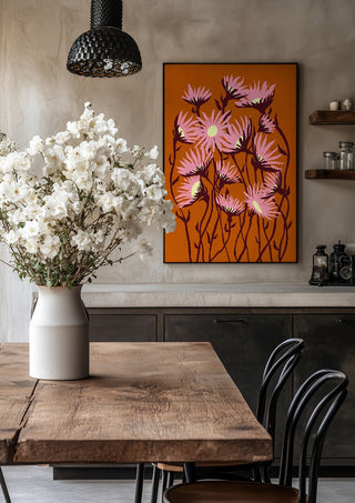 Whimsical flowers by Astrid Lind in a black frame above a rustic table with white flowers