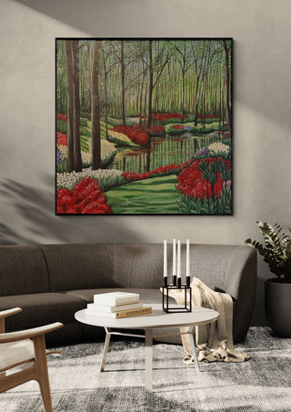Spring by Dina in a black frame above a grey sofa with candlesticks