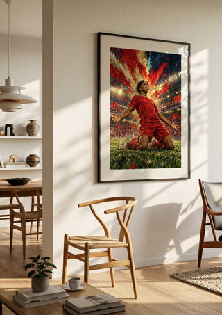 Rio Ngumoha Celebration by Danii Steinfeldt in a black frame in a bright dining room with wooden chairs