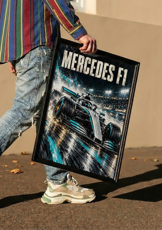 Mercedes F1 by Danii Steinfeldt carried in a black frame along a sunny street