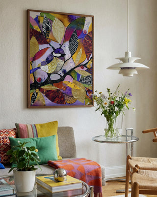 Little Tit in November by Enikő Marosváry-Kramcsák framed in a bright living room