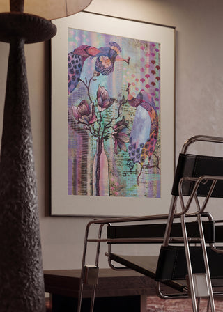 Peacocks & Magnolias by Enikő Marosváry-Kramcsák in a mounted frame in a modern interior