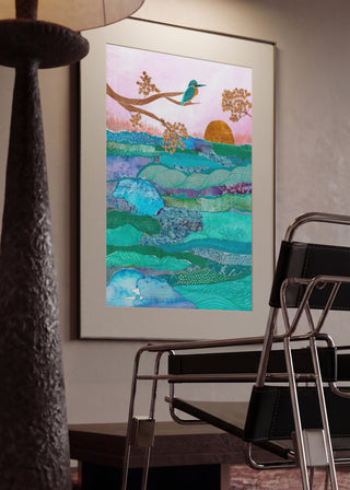 Kingfisher at Sunset by Enikő Marosváry-Kramcsák in a mounted frame in a modern interior