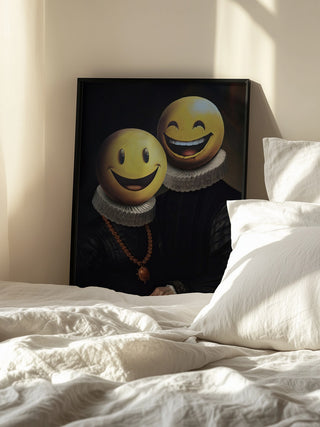 Framed art of two figures in ruffled collars with yellow smiley faces, propped against a bedroom wall.