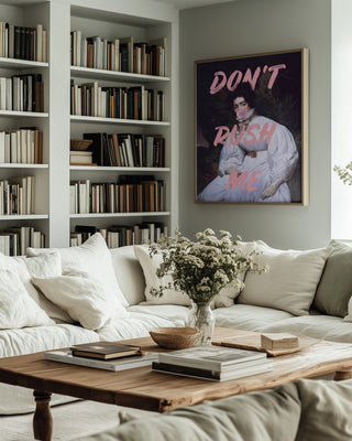 Framed Sassy Lady Pink Bubble - Talitha McQueen art above a cozy sofa in a modern living room.