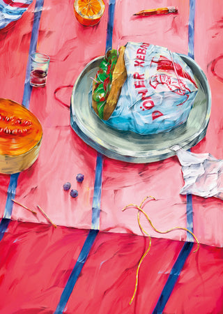 Doner Kebab Picnic by Natascha Baumgärtner – doner kebab, melon and orange on a striped pink tablecloth