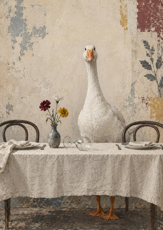The Uninvited Guest by Matthews Gallerie — a white goose standing at a laid dining table with flowers and a toppled wine glass