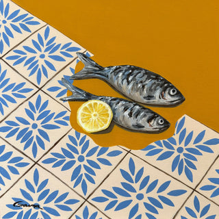 Vacation by Elva Garma - two sardines and half a lemon on mustard cloth over blue patterned tiles