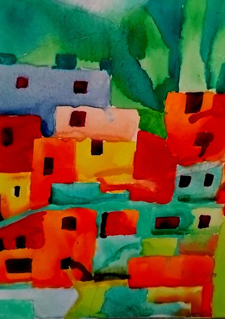 Houses of Favela by Nittaart - flat-roofed houses stacked up a green hillside in orange, red and teal