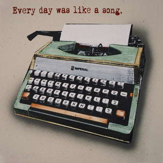 Like a Song by Carl Smith ART - a mint green vintage typewriter with a typed line above it