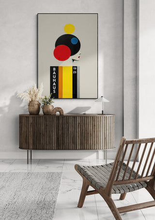 Bauhaus Woman 03 by David Wolf art print displayed above a wooden console in a modern, minimalist living room.