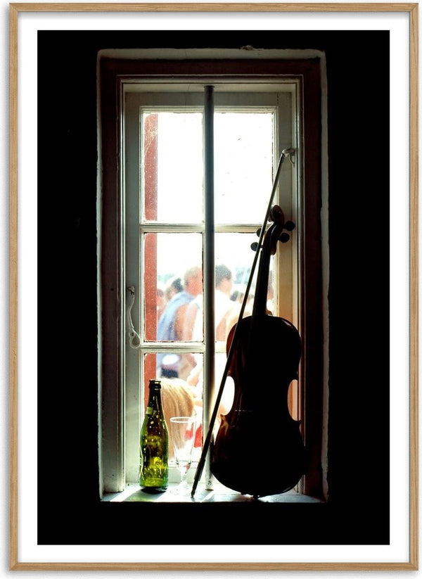 A Nice Day by Bent Hardervig - a violin in a sunlit window with a green bottle, seen from a dark room
