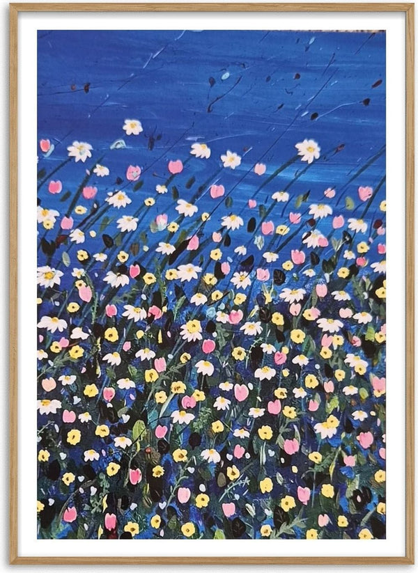Daisies by Rebecca Wright - white daisies and pink tulips in a meadow against a deep blue sky