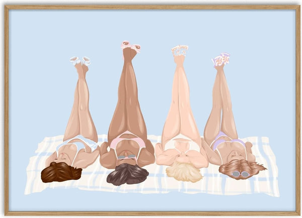 Girls at the beach by Lisen Vennesland - four women on a checked towel with their legs in the air